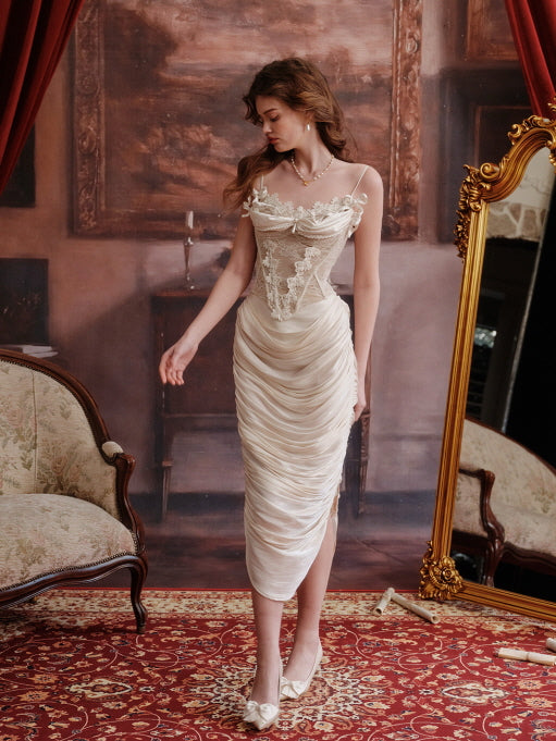 Cream ruched satin skirt paired with lace corset top, photographed in a vintage interior with ornate decor – romantic fairytale-style fashion for women