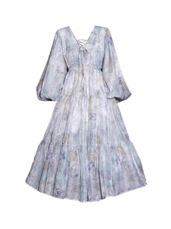Front view of a lavender floral dress with a lace-up neckline and voluminous sleeves, creating a soft, ethereal silhouette for a fairytale-inspired look.