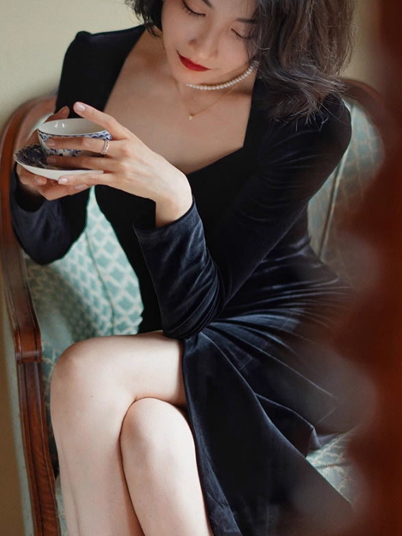 Elegant Black Velvet Dress with Gold Accents