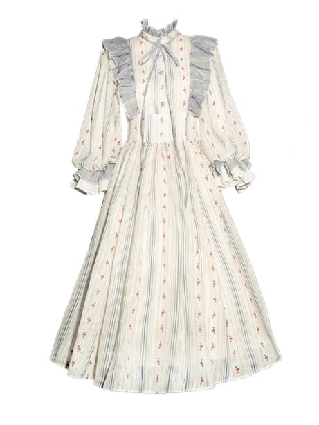 Vintage fairytale dress close-up showing delicate fantasy ruffles, floral embroidery, and romantic aesthetic textures.