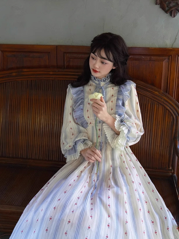 Woman sitting gracefully on a wooden bench wearing a fantasy vintage dress with ruffle details, embodying a romantic fairytale aesthetic.