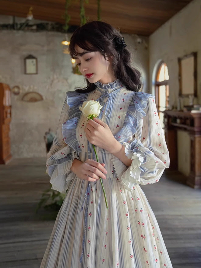 Close-up of woman in fantasy-inspired vintage dress, holding a rose with soft, dreamy expression.
