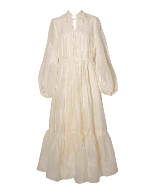 Full view of an elegant fairytale dress with vintage embroidery and tiered design, capturing a romantic fantasy and aesthetic outfits style.