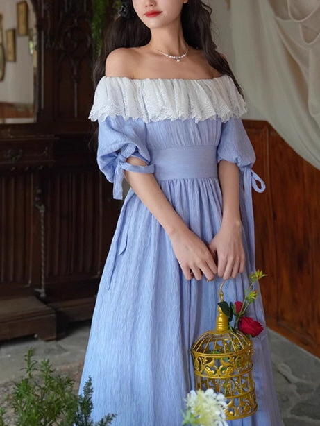 A girl in a dreamy blue fairytale dress with white lace ruffles, standing gracefully while holding a golden birdcage, in a vintage aesthetic setting full of flowers.