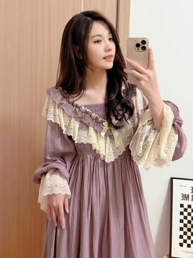 Aesthetic mirror selfie of a woman wearing a vintage purple fairytale dress with layered lace decorations and voluminous sleeves, styled in a soft fantasy outfit look.
