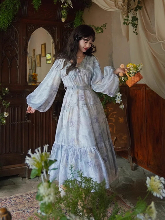 A whimsical lavender floral dress with voluminous sleeves and a gathered bodice, capturing a vintage-inspired fairytale aesthetic with a floral basket.