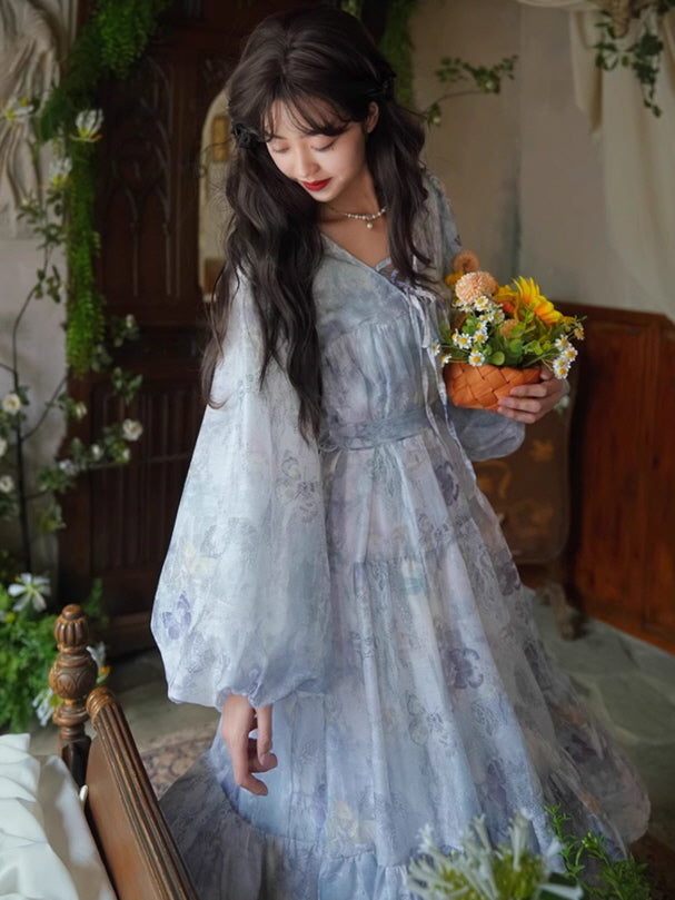 A delicate lavender gown with a soft floral print and tiered ruffles, paired with a woven basket of flowers, capturing a fairytale-inspired aesthetic.