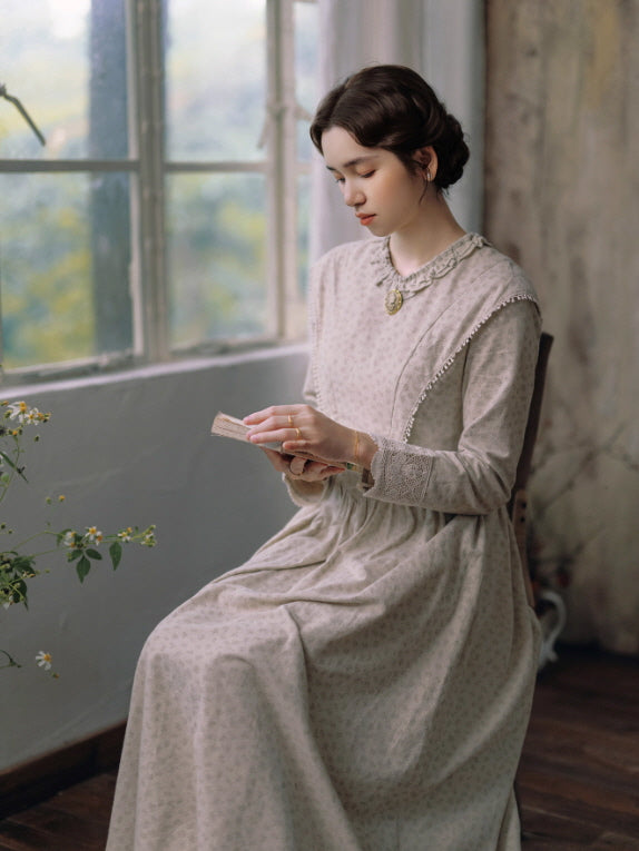 Ruffle collar and lace cuffs, model sitting by a bright window reading a book, soft vintage cottagecore aesthetic fashion from Romantic Fairytale