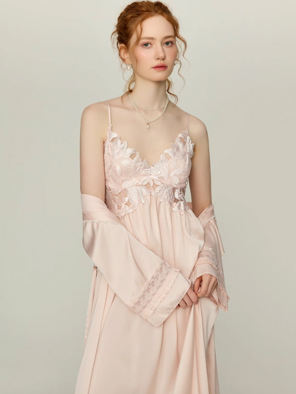 Close-up of blush pink nightgown with 3D floral lace bodice and flowing skirt, soft cottagecore and vintage-inspired sleepwear by Romantic Fairytale.