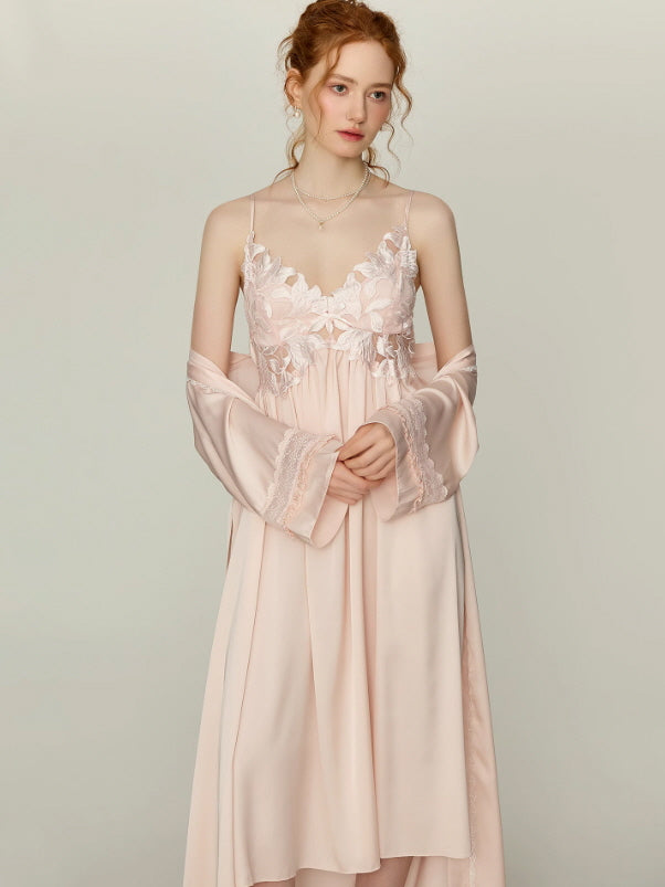 Model wearing a blush floral lace nightgown with matching long robe sleeves draped off the shoulders, romantic princesscore loungewear from Romantic Fairytale.