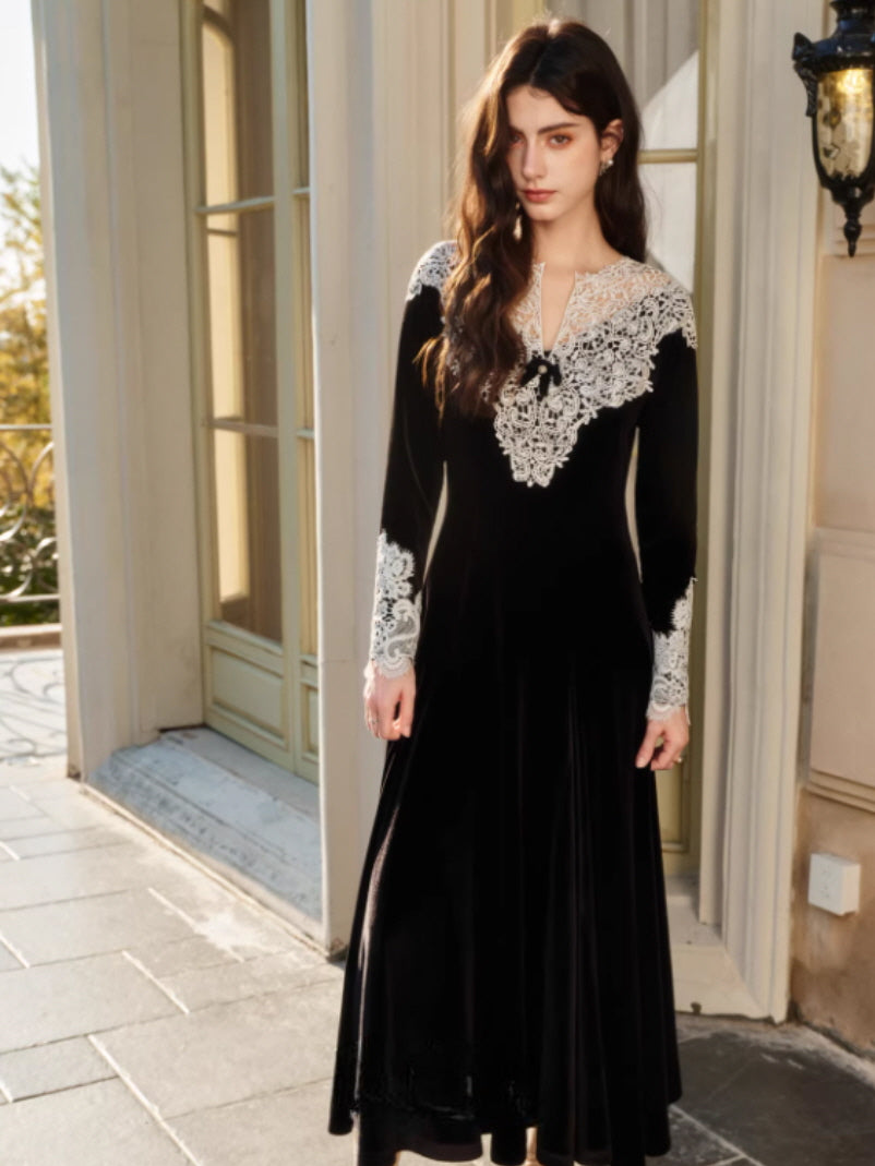 Elegant black long dress with white lace neckline and cuffs, styled in a vintage balcony setting with a timeless cottagecore and fairycore evening mood.