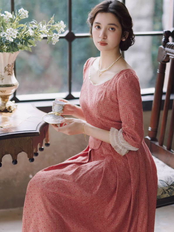 Elegant vintage inspired pink dress with square neckline and pearl necklace, feminine tea time aesthetic