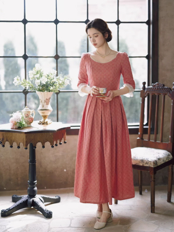 Fairycore inspired pink long sleeve dress with flowing silhouette, graceful cottage tea room setting