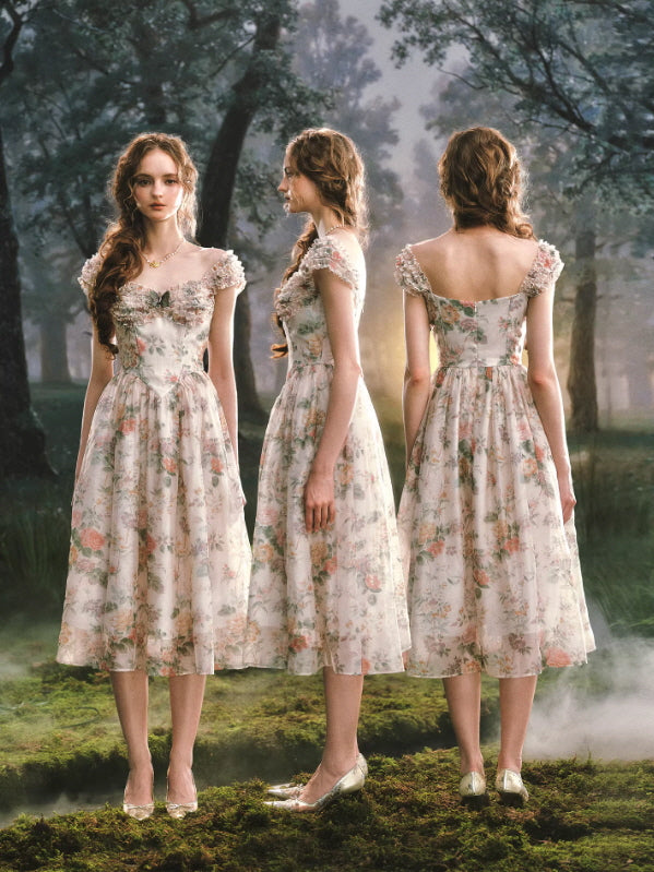 three view front side back of floral cottagecore dress with ruffle sleeves and vintage silhouette