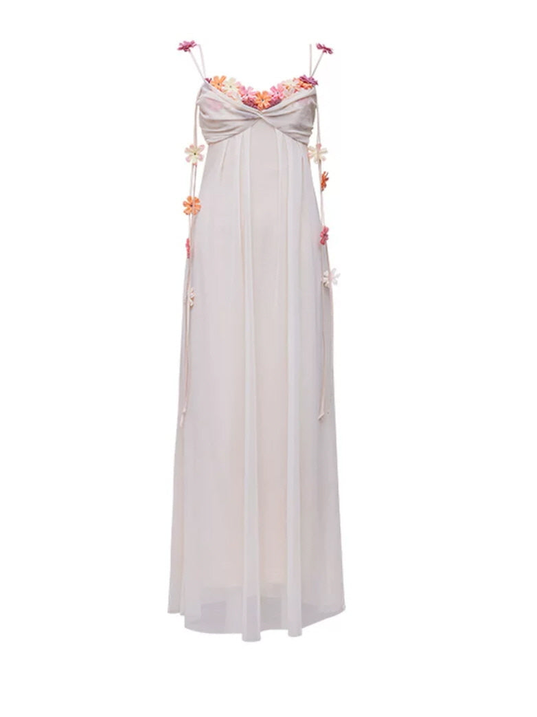 Sleeveless ivory floral fairy dress with sheer flowing fabric and pastel flower details