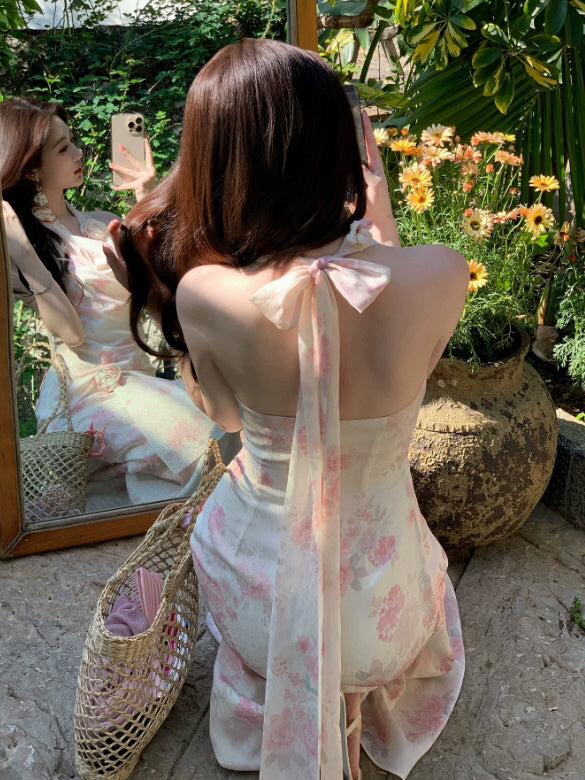 Pink cottagecore floral halter dress with back ribbon tie and dreamy garden styling