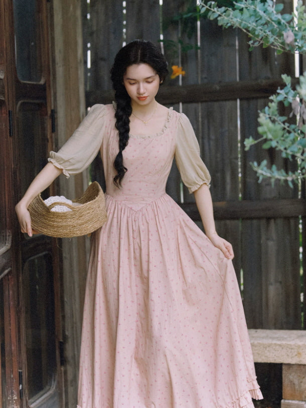 Vintage pink floral maxi cottagecore dress styled with puff sleeves and woven basket