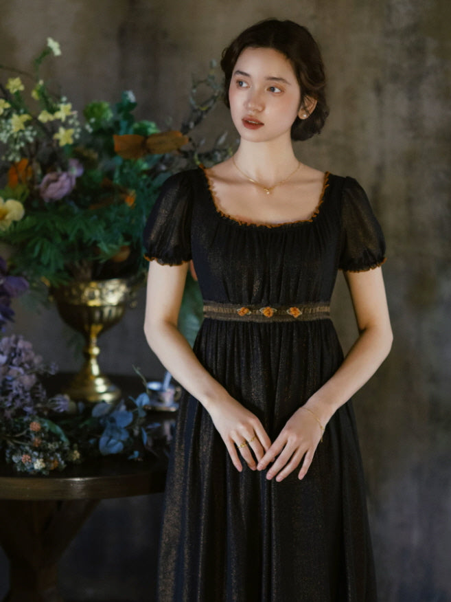 Dark romantic puff sleeve dress with square neckline, gathered bodice and floral waist detail styled with vintage flowers