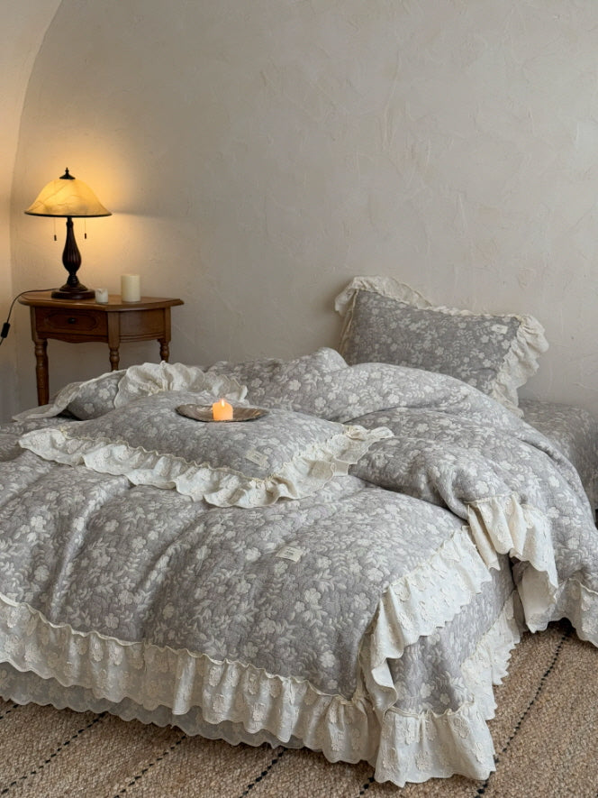 Romantic gray cottagecore bedding set with delicate botanical pattern and lace ruffle edges