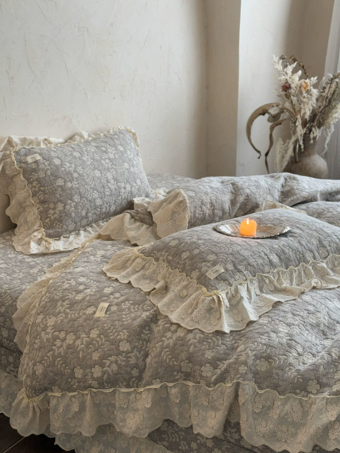 Gray floral ruffle bedding set with ivory lace trim in a romantic cottagecore bedroom