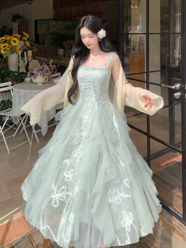 Vintage inspired sage green lace maxi dress with fitted bodice, ribbon bow and layered fairy tulle skirt