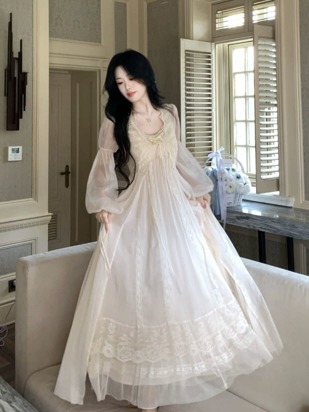 Cream vintage style lace nightgown with puff sleeves, ribbon ties and soft layered maxi skirt