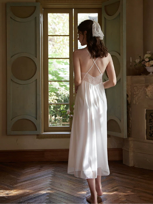 White vintage inspired nightgown with lace neckline, bow straps and feminine draped bodice