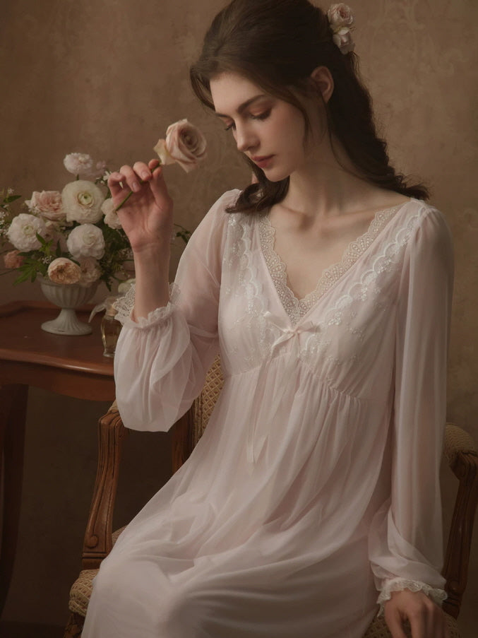 Dreamy white lace nightgown with embroidered bodice, empire waist and sheer long sleeves