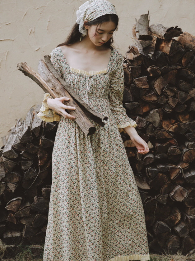 Vintage inspired cotton floral nightgown featuring gathered square neckline, ruffled cuffs and flowing maxi length