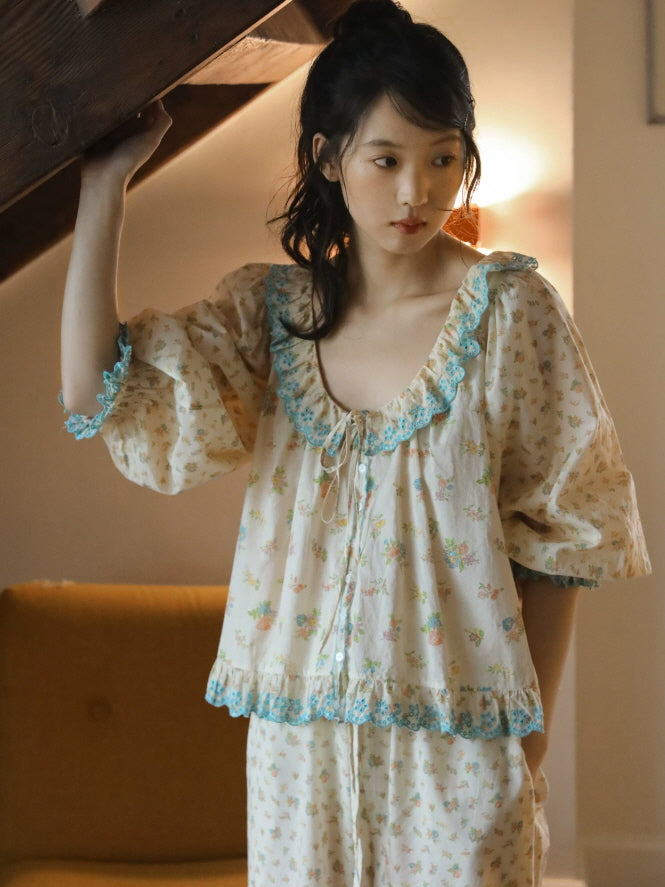 Vintage inspired floral cotton sleepwear set with puff sleeves, blue ruffle trim and front tie detail