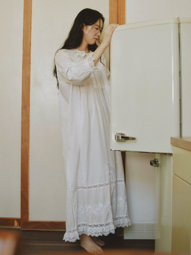 White vintage inspired cotton sleep dress with lace details and flowing relaxed silhouette