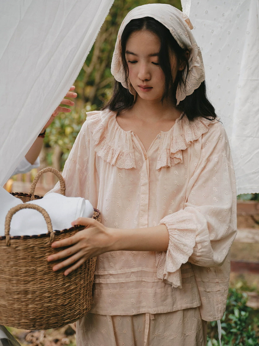 Romantic blush pink loungewear set with lace ruffles, embroidered fabric and relaxed silhouette