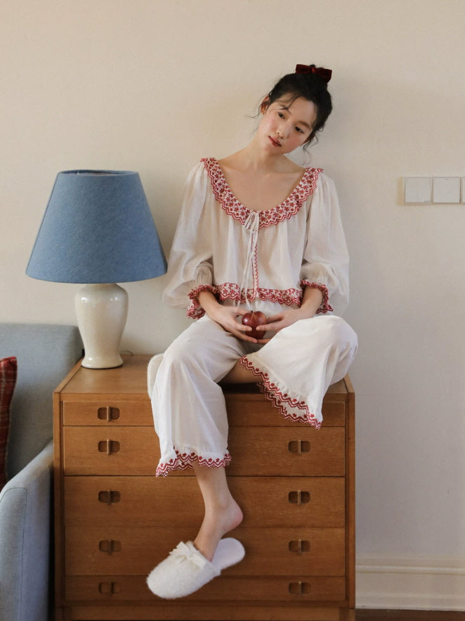 Vintage inspired white pajamas with red embroidered neckline, ruffled cuffs and feminine details