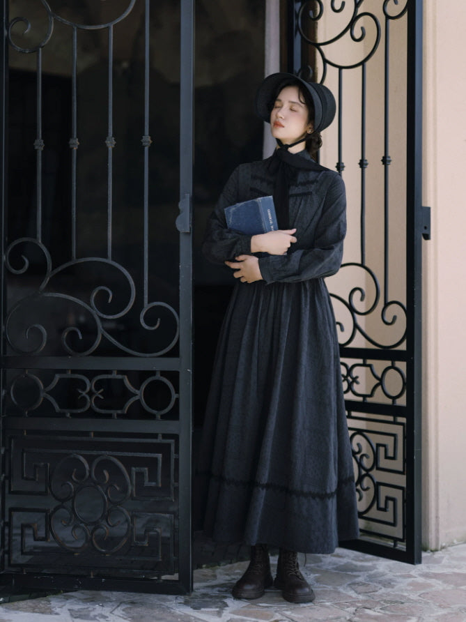 Black Victorian inspired maxi dress with bonnet, high neck and long gathered sleeves