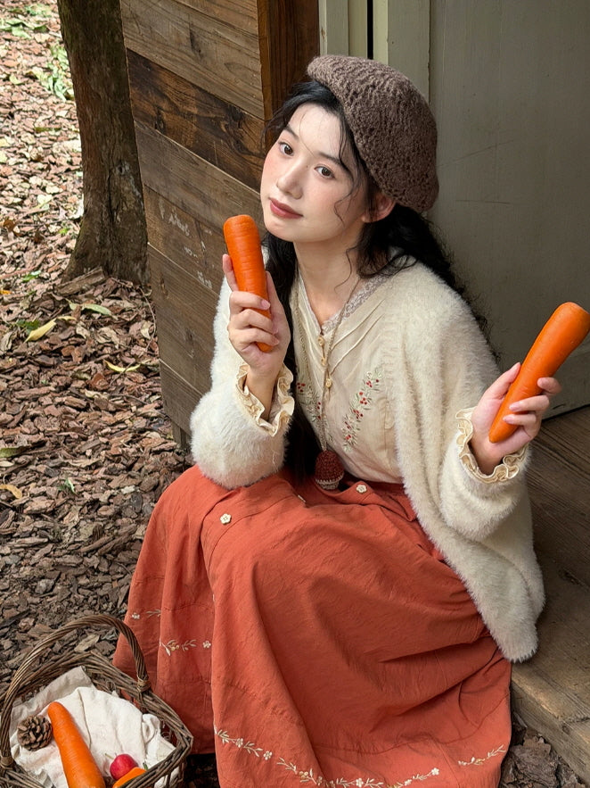 Cottagecore fall outfit featuring ivory floral embroidered blouse, rust orange maxi skirt and cream knit cardigan