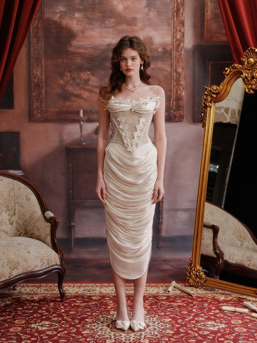 Romantic cream ruched satin skirt paired with a lace embroidered corset top, styled in a vintage interior with ornate decor – fairytale aesthetic women's outfit