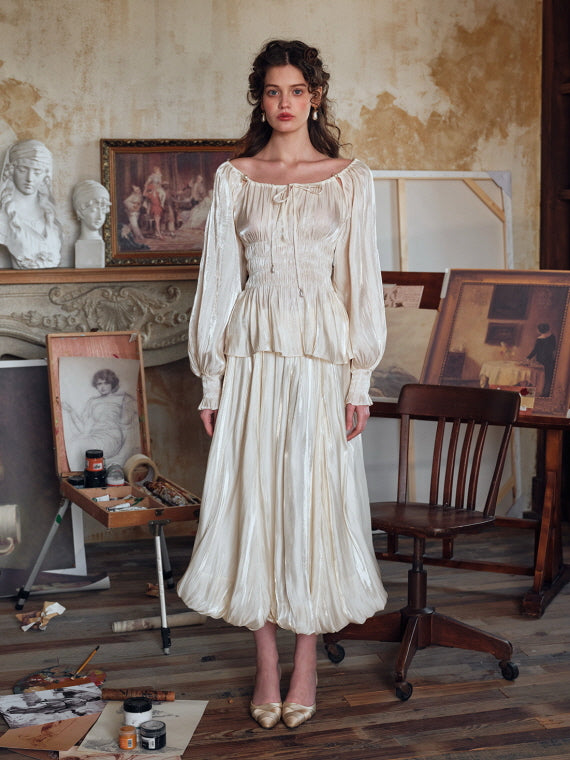 Vintage-inspired cream balloon skirt with matching ruched blouse, styled in a classic painter's studio – elegant women’s outfit with retro fairytale aesthetic