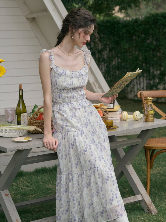 Romantic cottagecore outfit featuring a lavender floral aesthetic dress, styled with a braided hairstyle, outdoor picnic setting in a garden.
