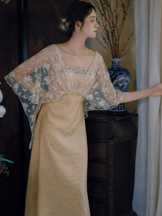 Wearing a romantic golden gown with delicate lace overlay, the woman gazes out gracefully, evoking a dreamy princesscore and vintage mood.