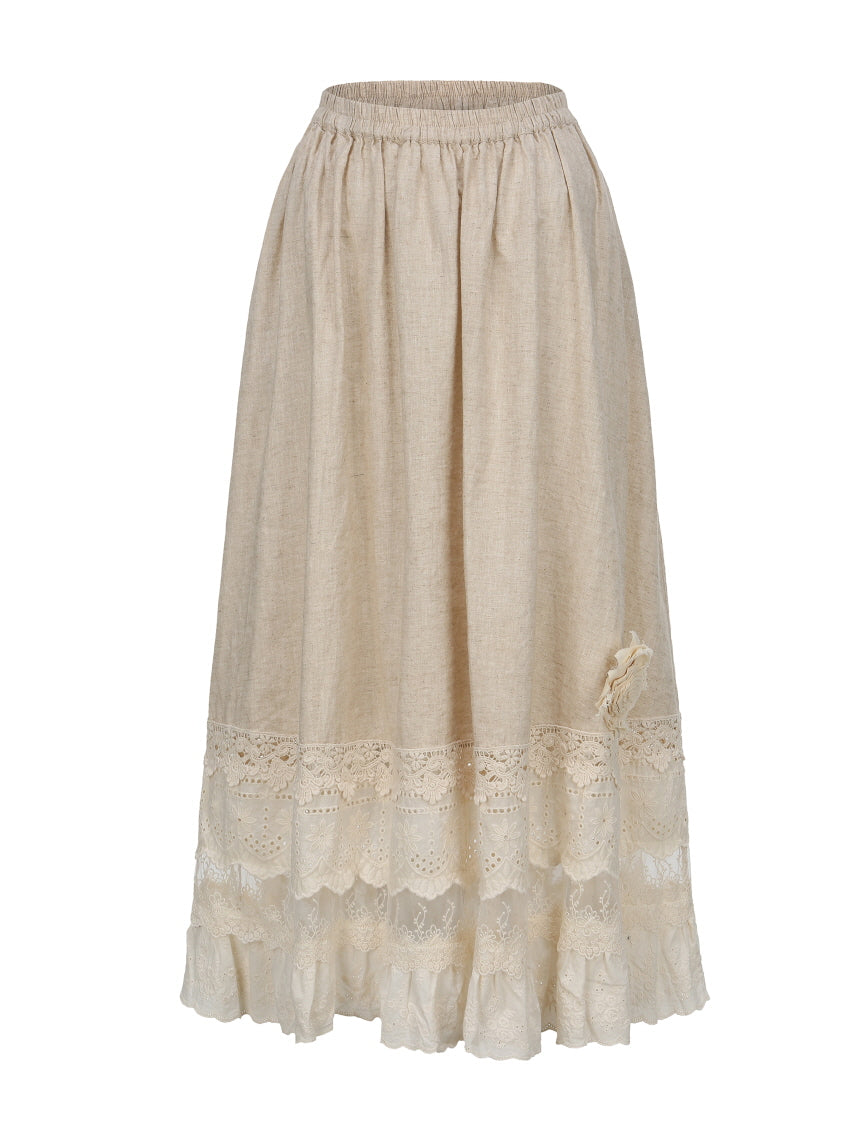Front view of a vintage-inspired beige skirt featuring tiered lace embroidery and a soft floral accent for a romantic cottagecore look.
