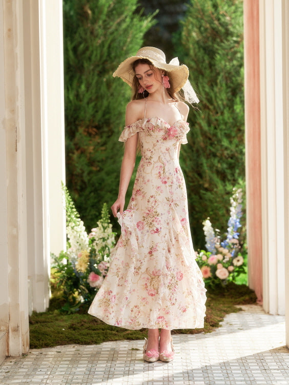 Wearing a ruffled floral dress and standing in a garden archway, the model evokes a graceful fairytale moment with a delicate coquette silhouette.
