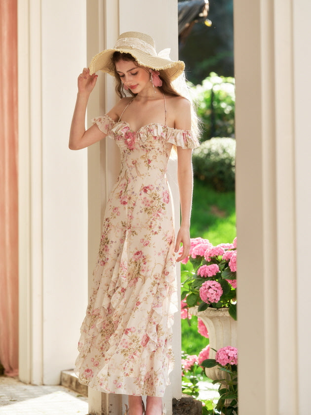 The model gently tilts her head with a soft smile, wearing a floral off-shoulder dress and sunhat that reflect a graceful princesscore summer mood.