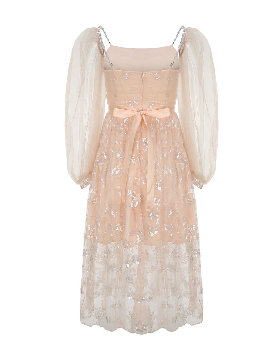 Back view of the pink sequin dress featuring a satin ribbon tie and puff sleeves, blending princesscore elegance with vintage-inspired charm.
