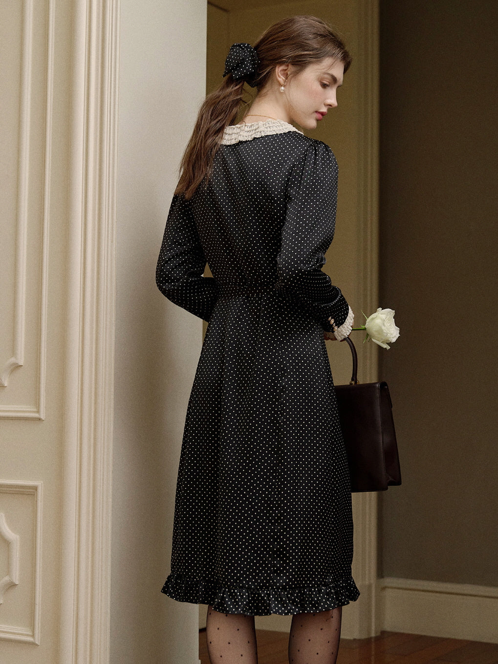 Vintage-Inspired Black Polka Dot Dress