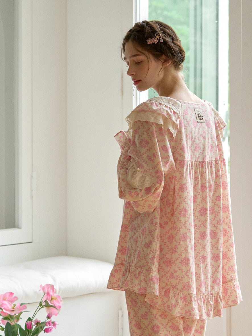 Back view of a delicate floral nightgown with lace accents, showcasing the relaxed fit and charming ruffle details for a fairytale-inspired aesthetic.