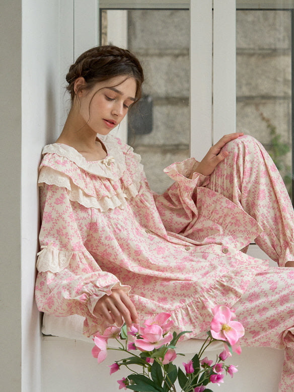 A peaceful, vintage-inspired look with a delicate floral nightgown and matching pants, styled with lace ruffles and soft, romantic tones.