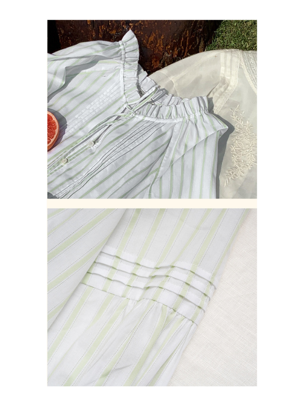 Close-up of a light green and white striped blouse featuring ruffled neckline, tie detail, and pleated accents. The soft, vintage-inspired fabric exudes a delicate, cottagecore aesthetic.
