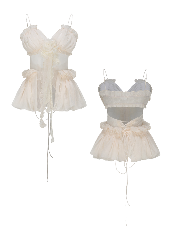A fairytale-style ivory corset top with floral accents, lace-up back, and ruffled peplum hem, perfect for a romantic fairycore outfit.