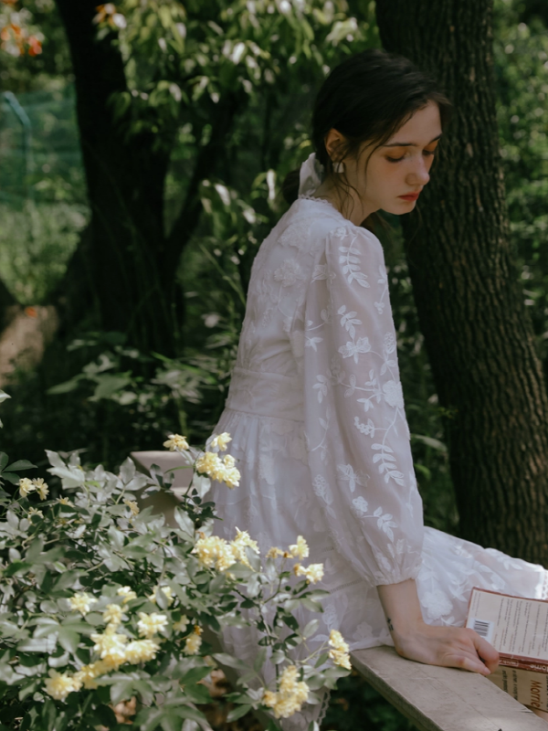 The Girl Reading in the Flower Garden Dress