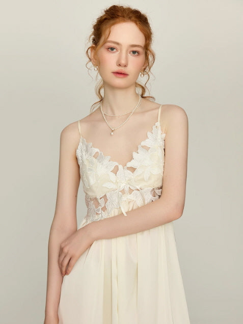 Close-up of ivory spaghetti strap nightgown with 3D floral lace bodice and soft chiffon skirt, elegant cottagecore sleepwear by Romantic Fairytale.
